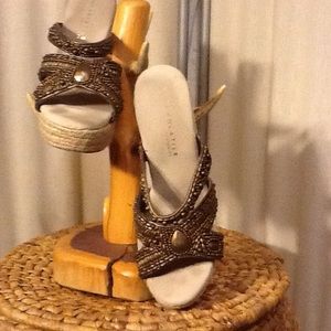 Very Volatile embellished bronze wedges.